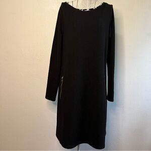 Gap classic black knit, long-sleeved dress. Two front zippers @ hip line. Sz M.